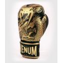 Venum Dragon's Flight boxing gloves black / gold