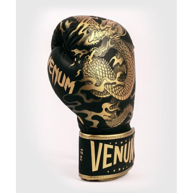 Venum Dragon's Flight boxing gloves black / gold